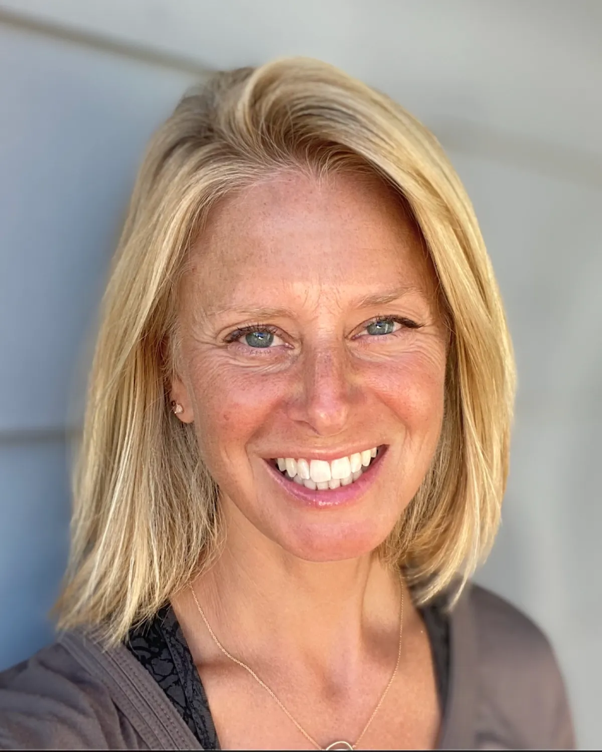 Black and white portrait of Mary Taylor, yoga instructor at The Cove