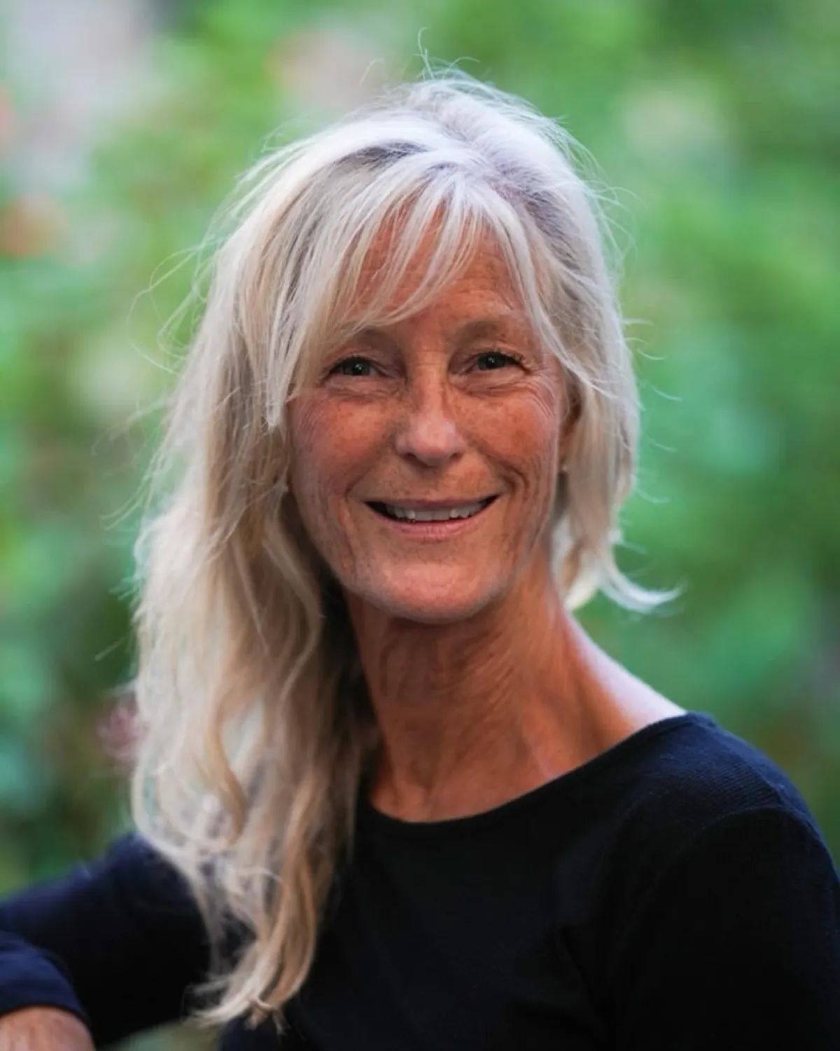 Black and white portrait of Tracey White, yoga instructor at The Cove